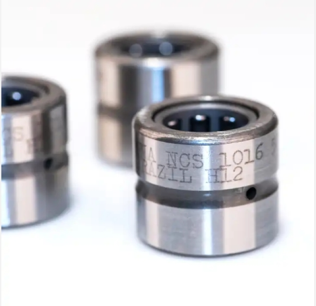 How do you calculate the proper fit tolerance for a bearing?