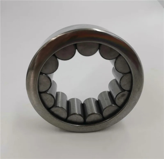What are the limitations of using plastic or nylon AS 90120 bearings?